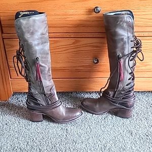 Knee high heeled boots